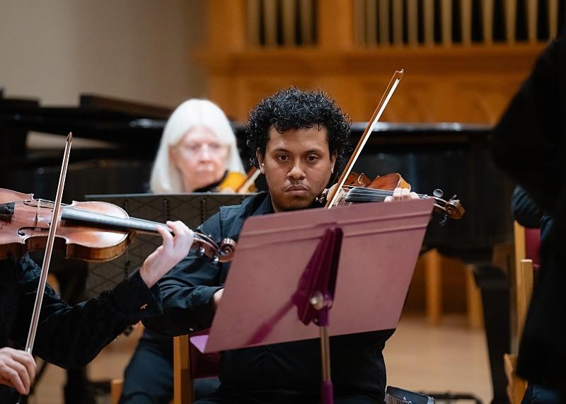 Washington Conservatory musicians performing for community members